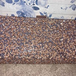 Rose gold clutch bag
